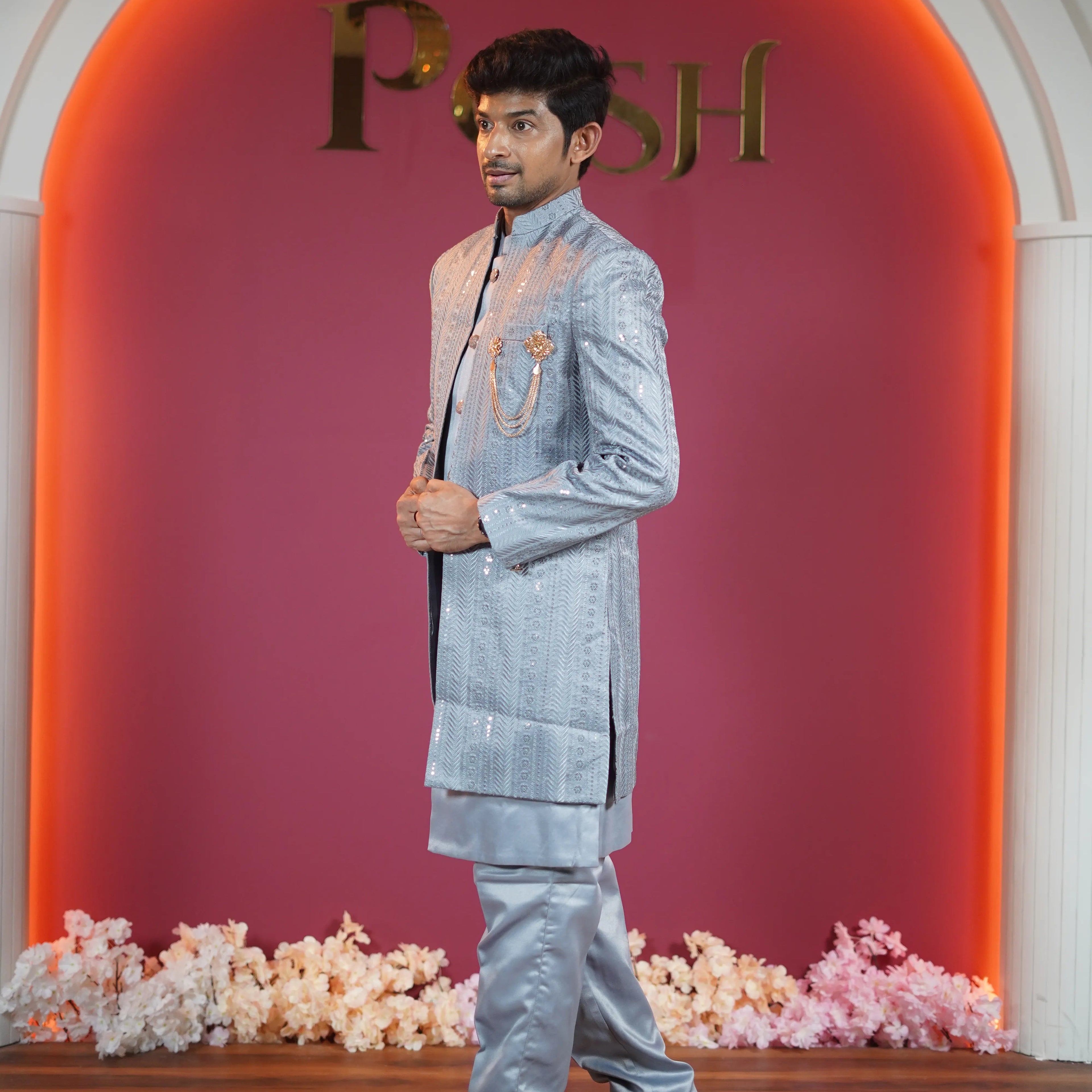 Silver grey designer sherwani for groom available at Posh Wedding Rental Kerala wedding sherwani rental