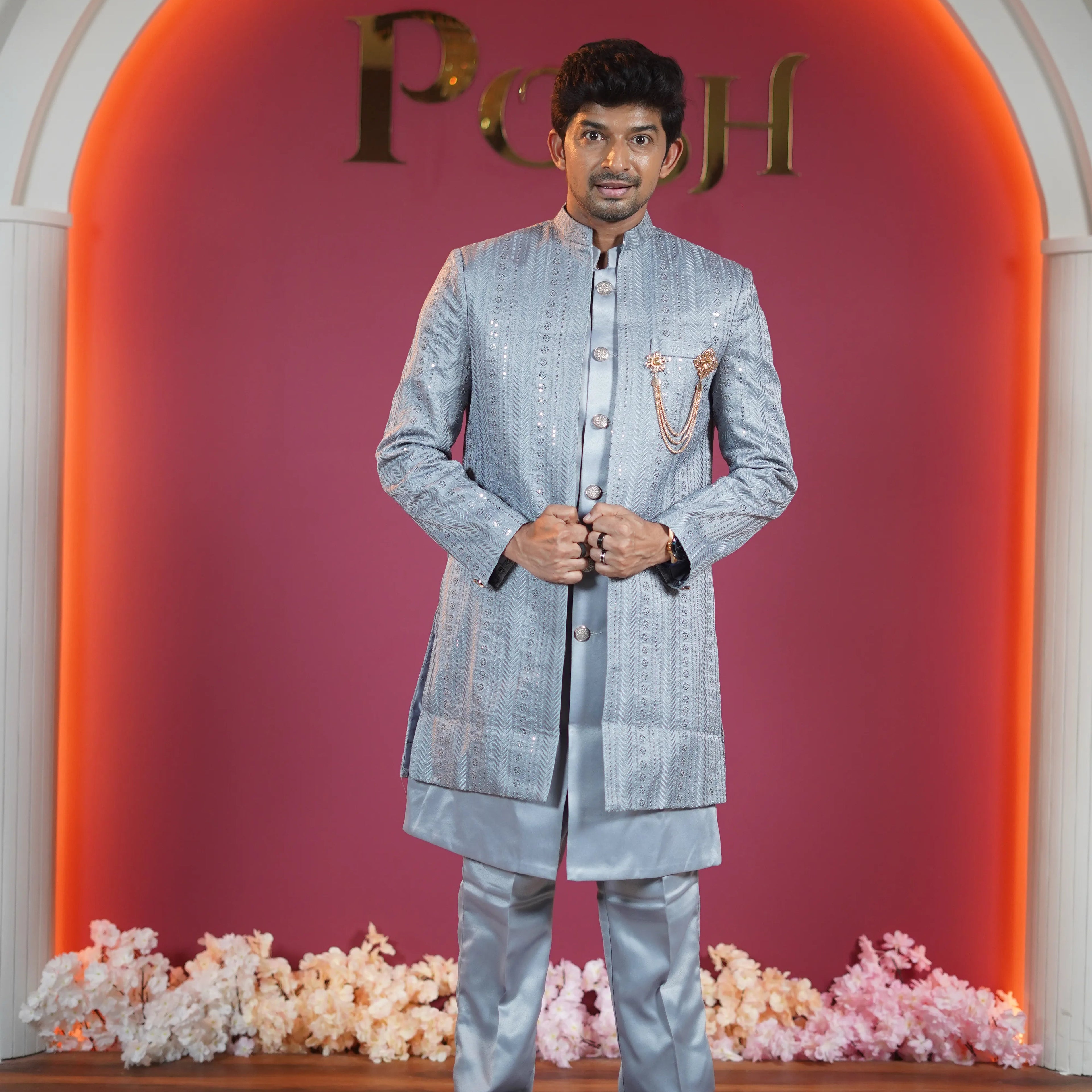 Silver grey designer sherwani for groom available at Posh Wedding Rental Kerala wedding sherwani rental