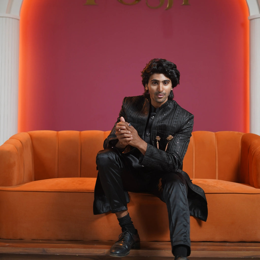 Black designer groom Indo-Western available on rent at Posh Wedding Rentals Kerala.

