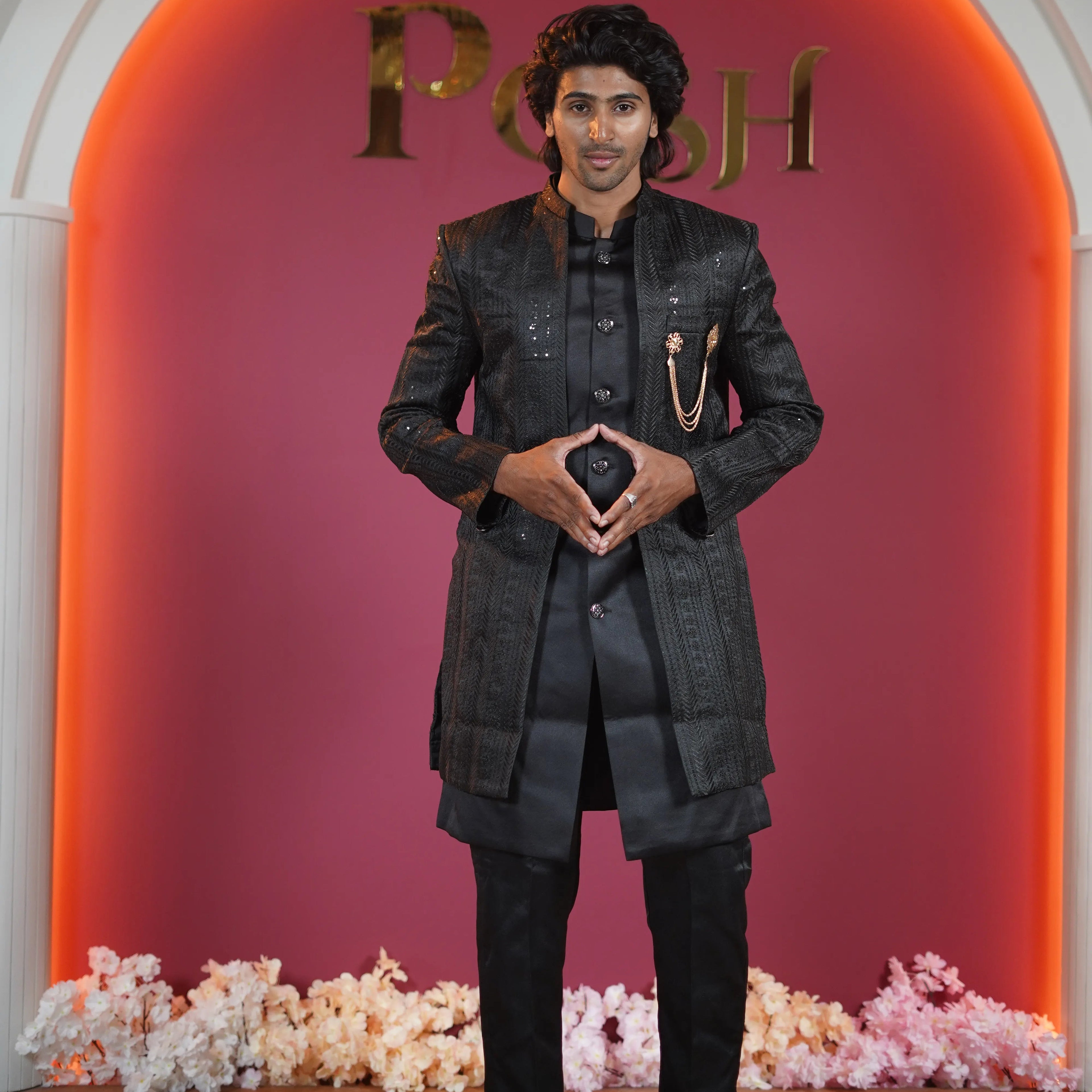Black designer groom Indo-Western available on rent at Posh Wedding Rentals Kerala.
