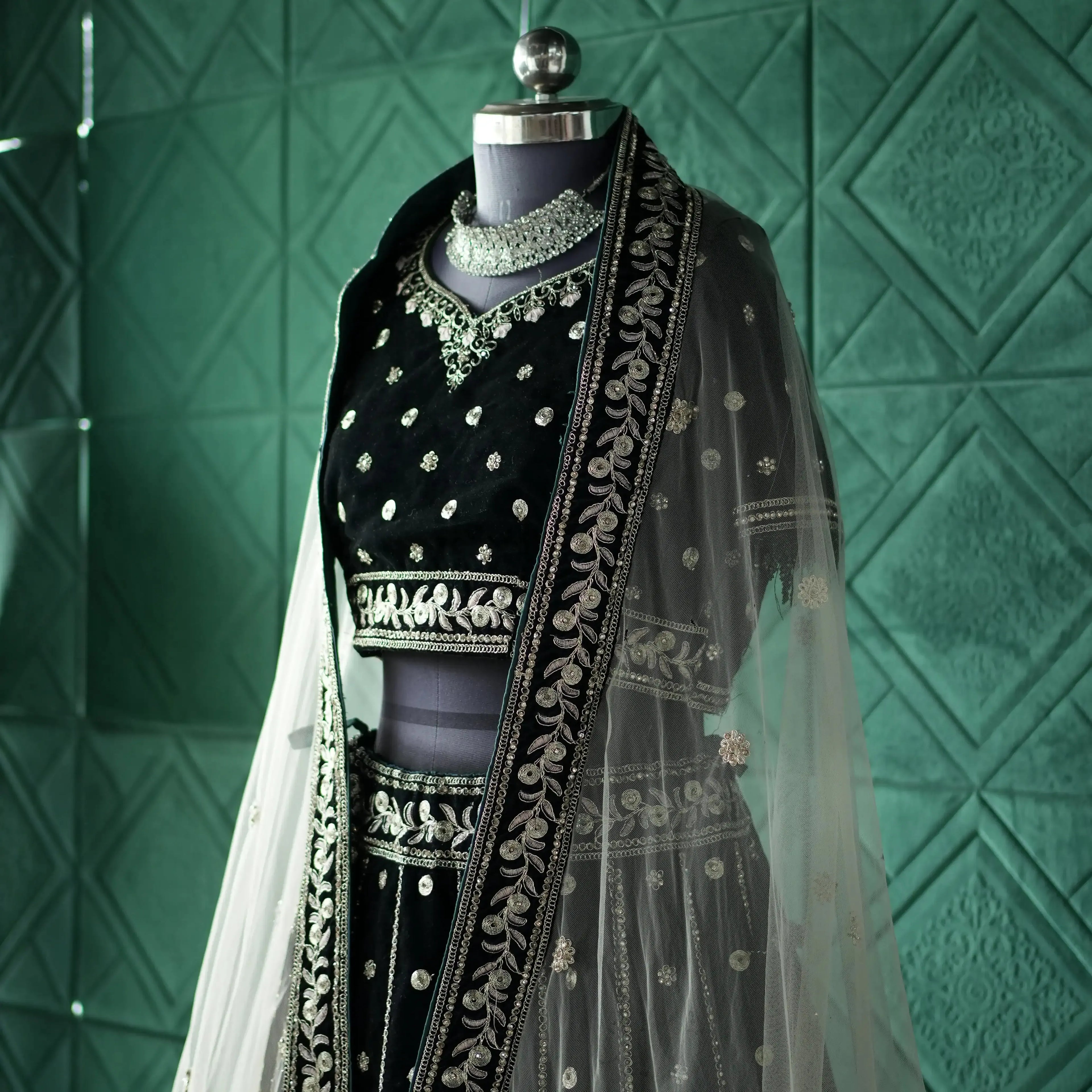 modern bridal outfit rental kerala black lehenga