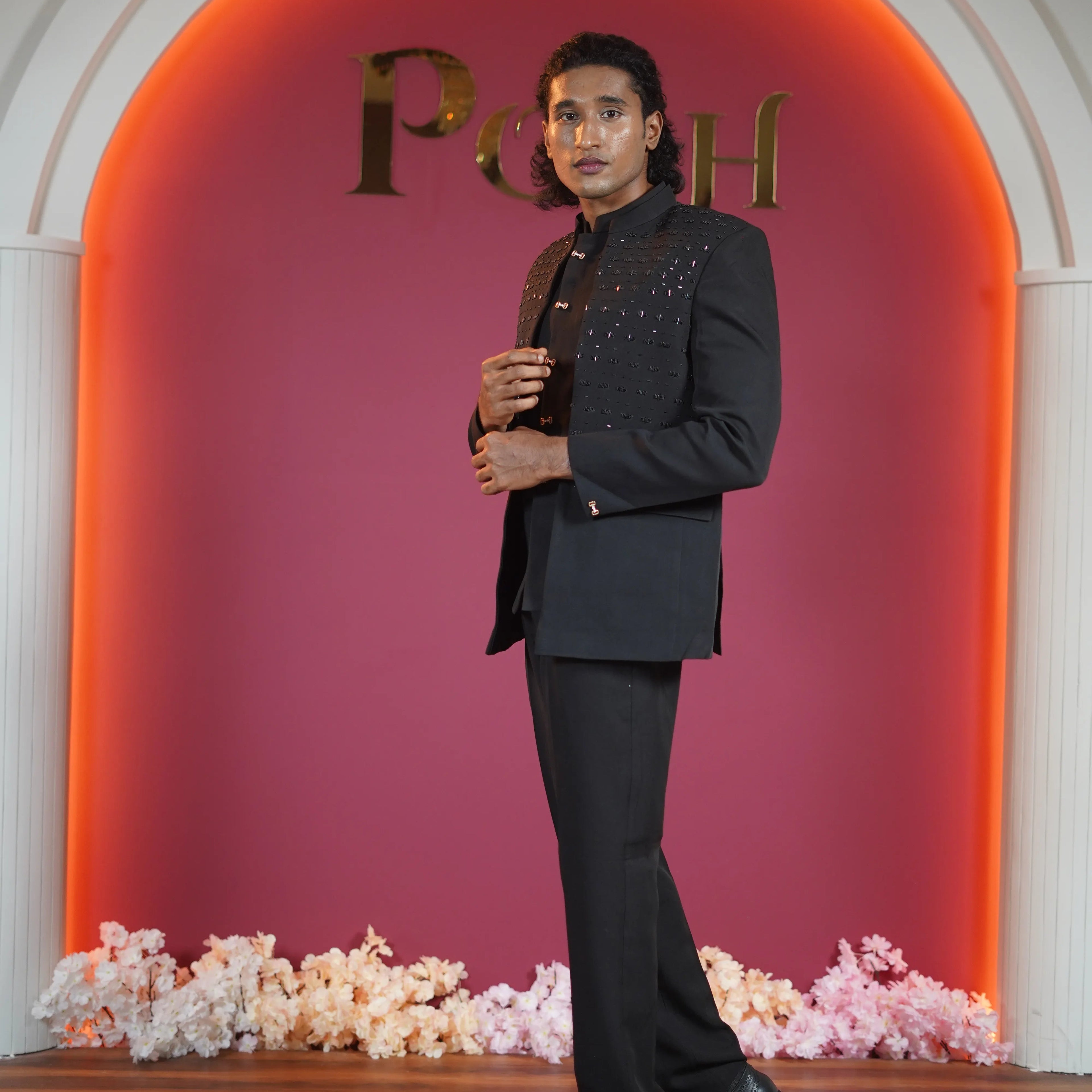 Black embellished Jodhpuri suit for groom available at Posh Wedding Rental Kerala wedding suit rental