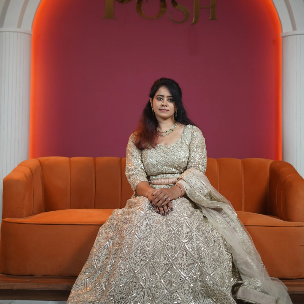 champagne gold embroidered designer lehenga with dupatta available at Posh Wedding Rental Kerala lehenga rental