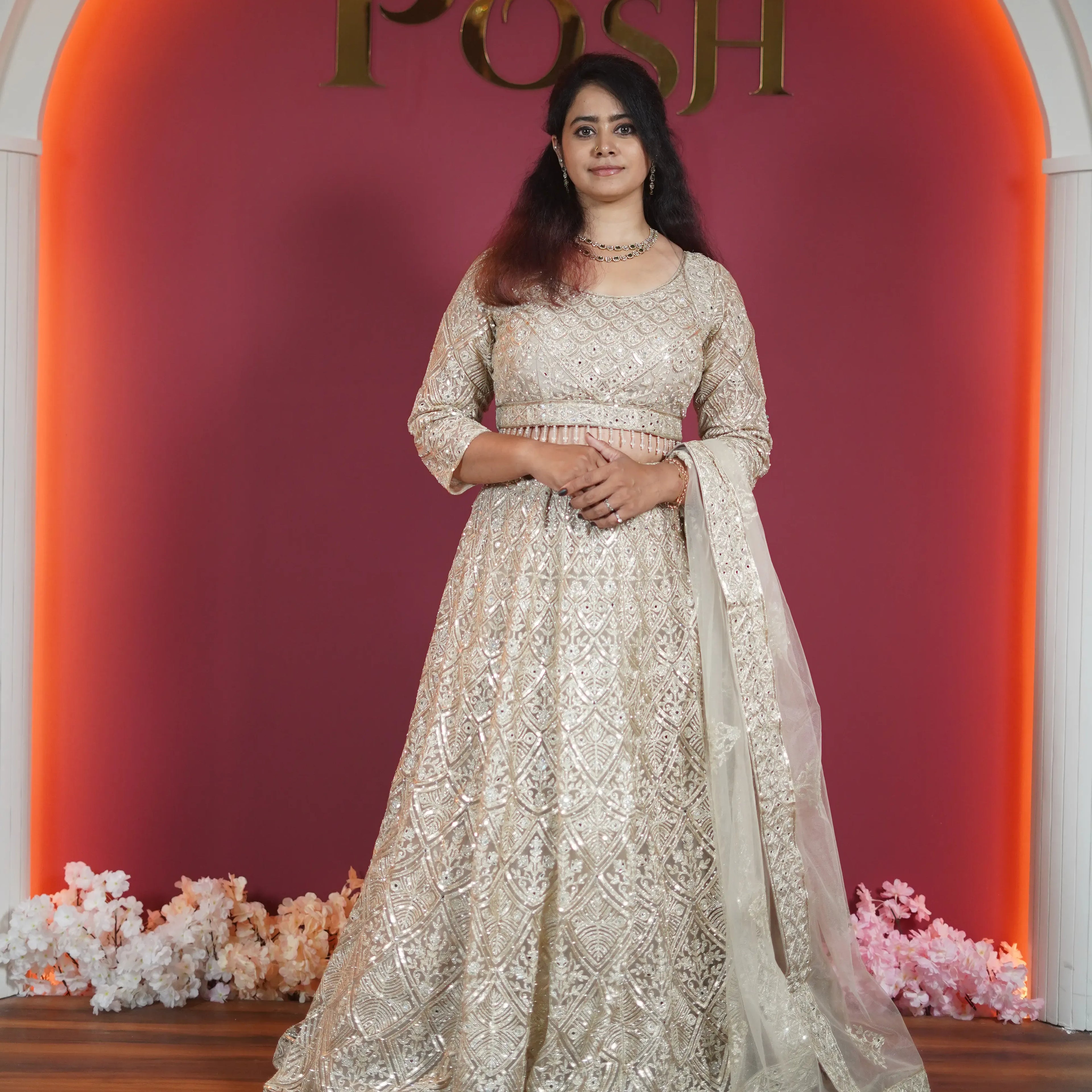 champagne gold embroidered designer lehenga with dupatta available at Posh Wedding Rental Kerala lehenga rental