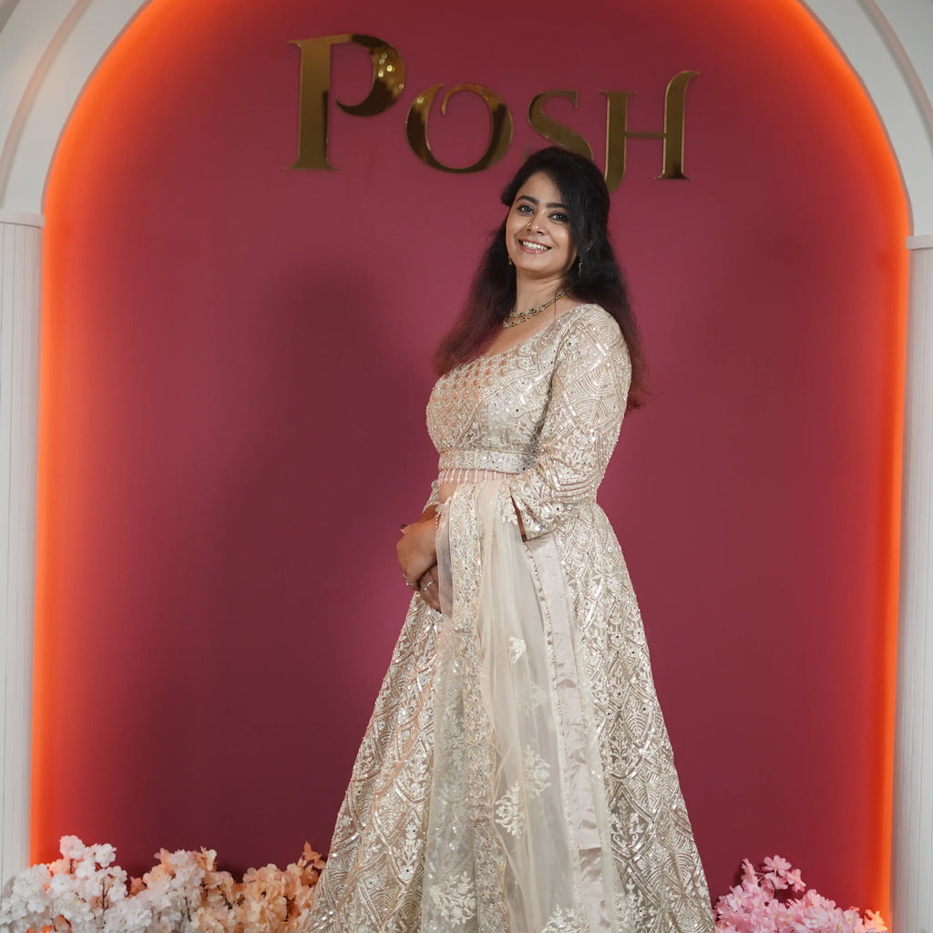 champagne gold embroidered designer lehenga with dupatta available at Posh Wedding Rental Kerala lehenga rental