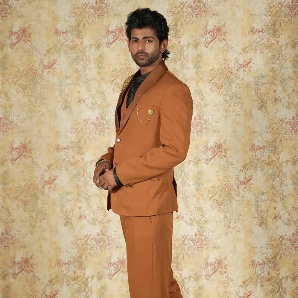 Designer groom suit in copper brown