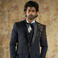 Dark blue wedding suit rental with waistcoat and bow tie