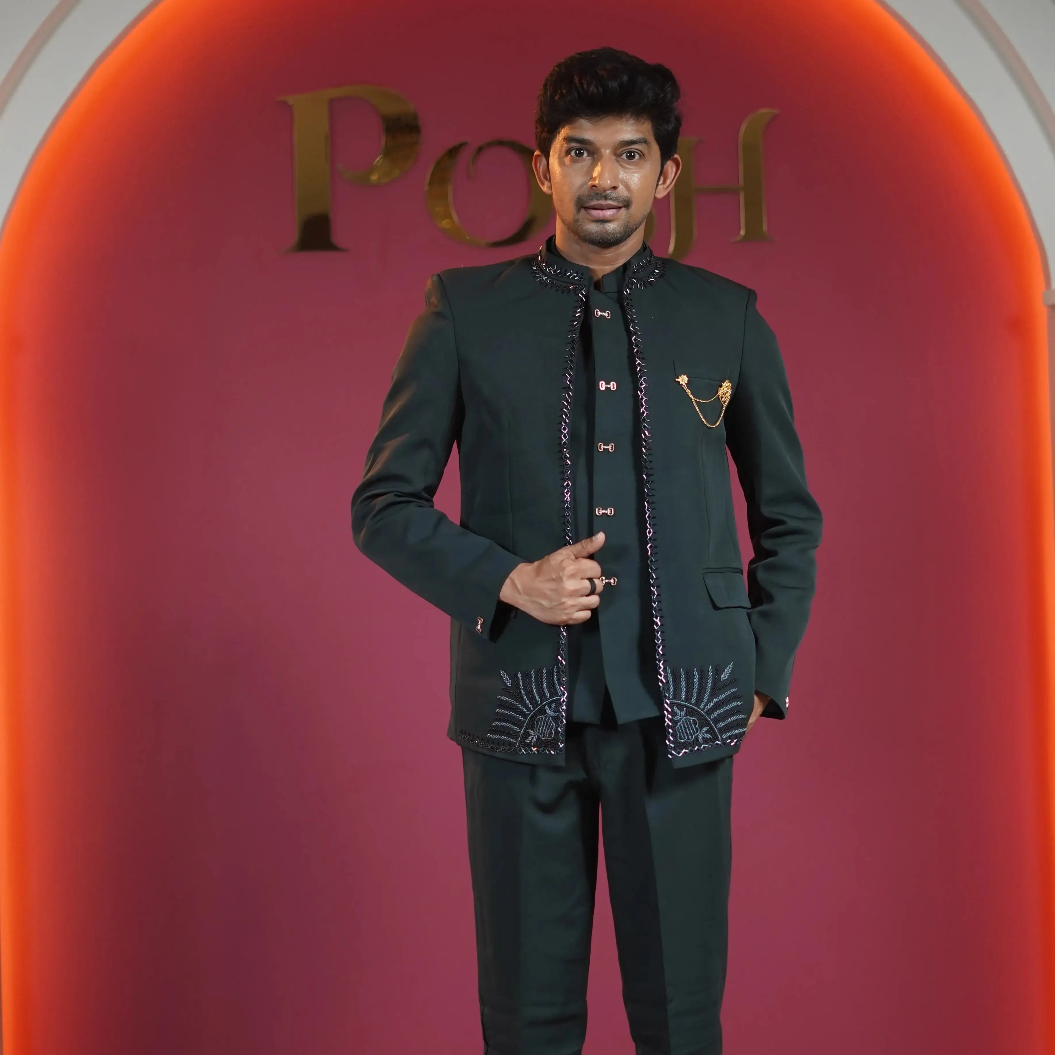 dark green designer jodhpuri suit for groom available at Posh Wedding Rental Kerala groom suit rental