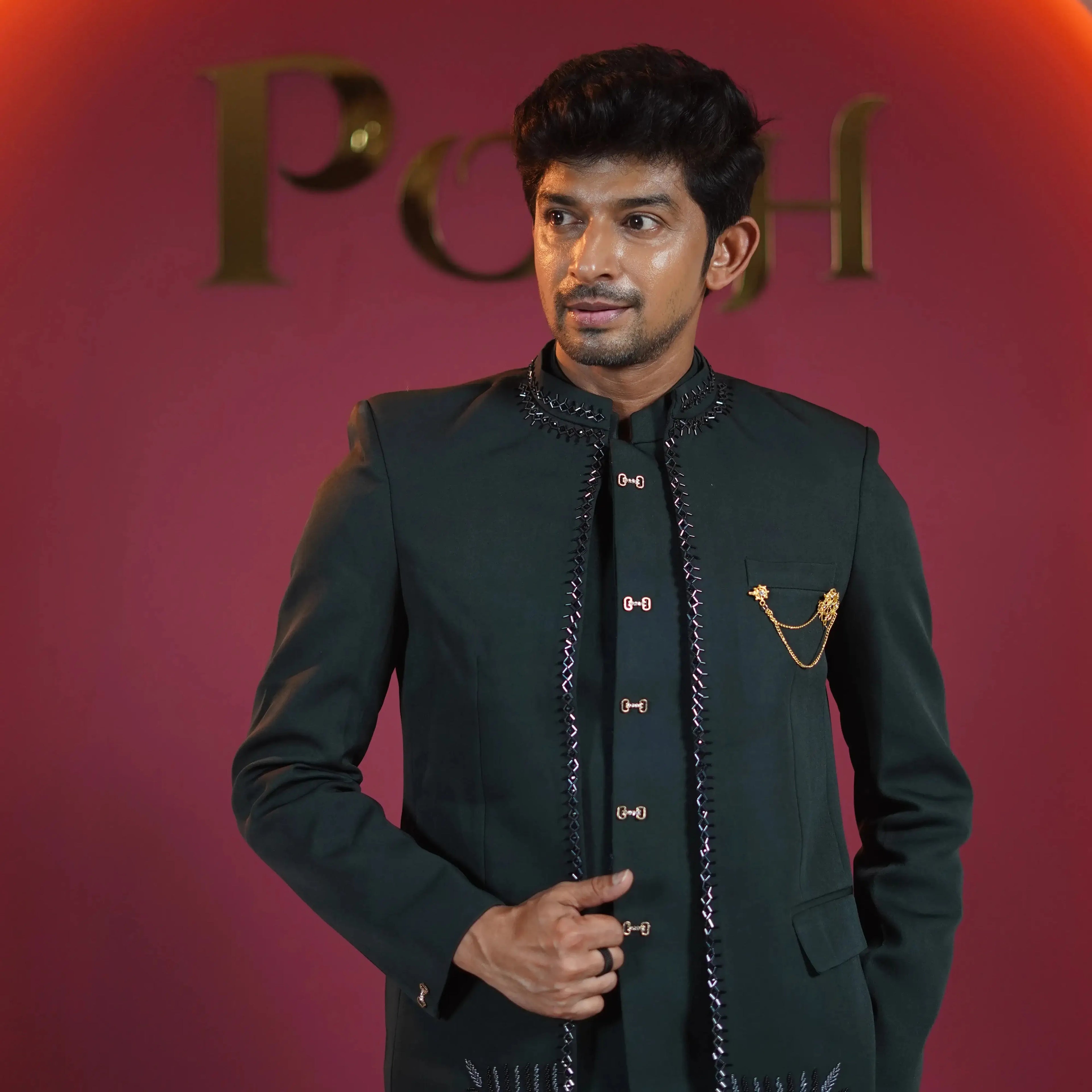dark green designer jodhpuri suit for groom available at Posh Wedding Rental Kerala groom suit rental