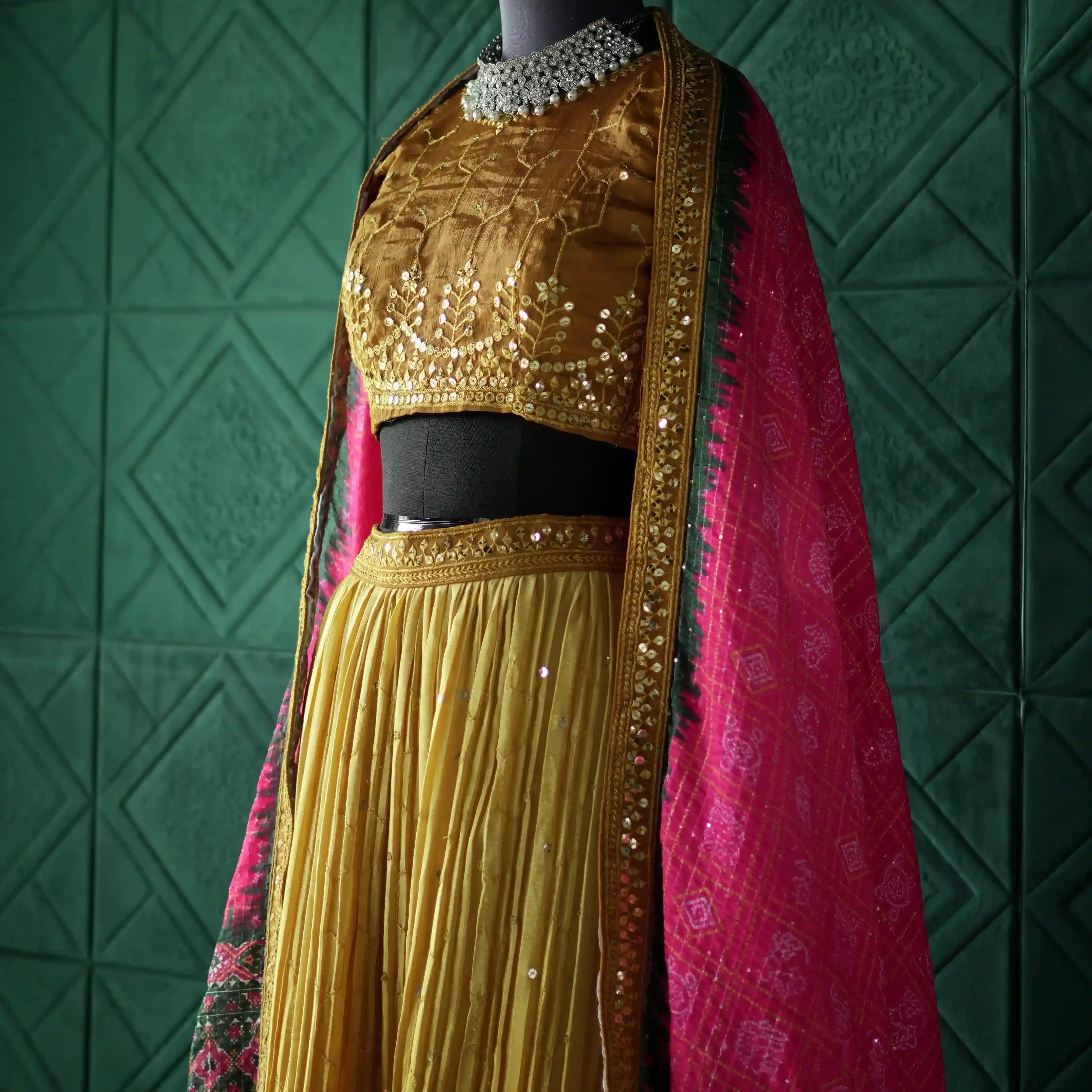 mustard bridal lehenga with pink dupatta rental