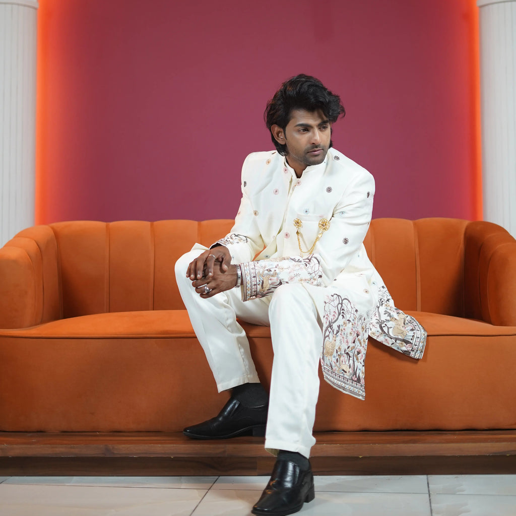 ivory embroidered designer sherwani for groom available at Posh Wedding Rental Kerala sherwani rental