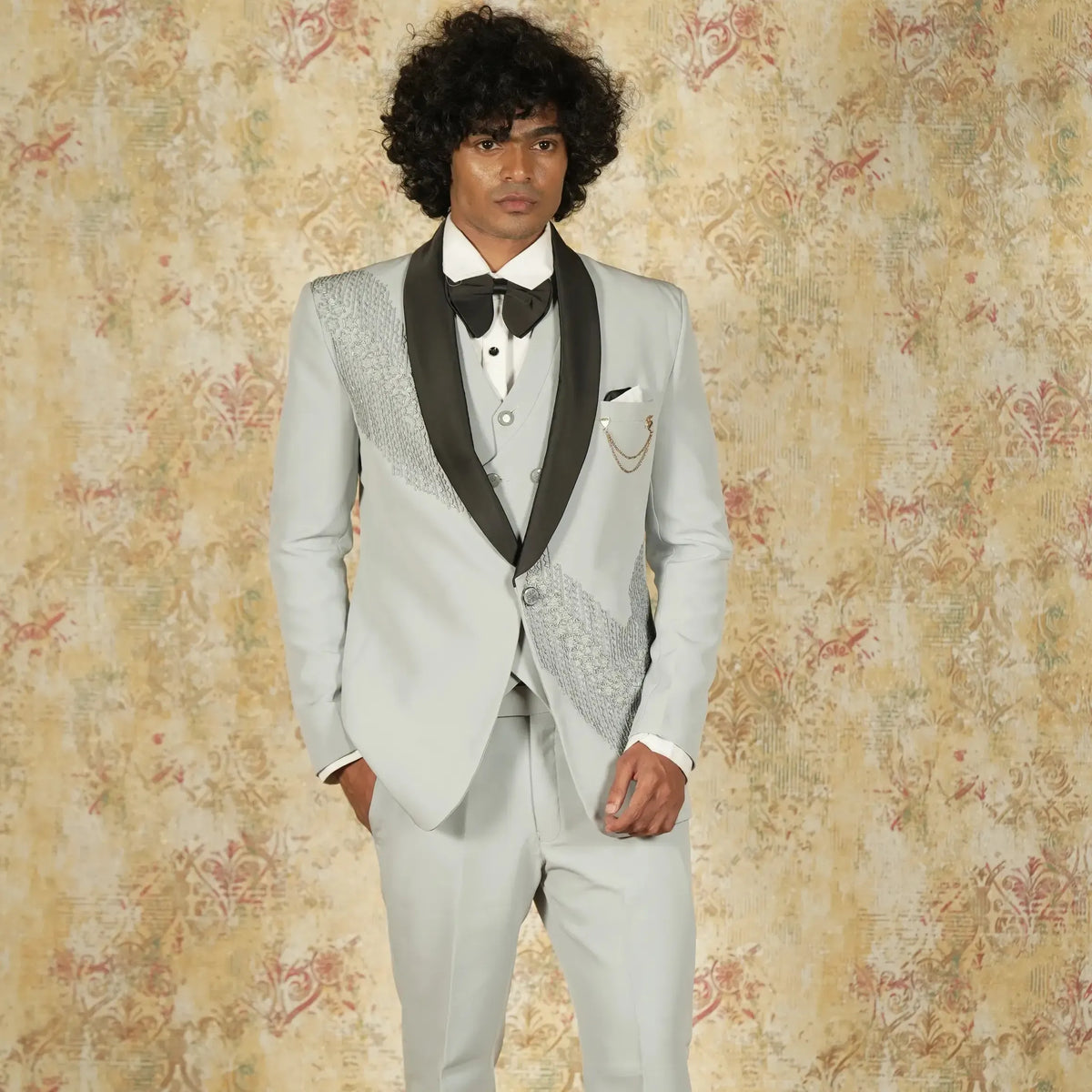 Light grey designer tuxedo suit with black shawl lapel