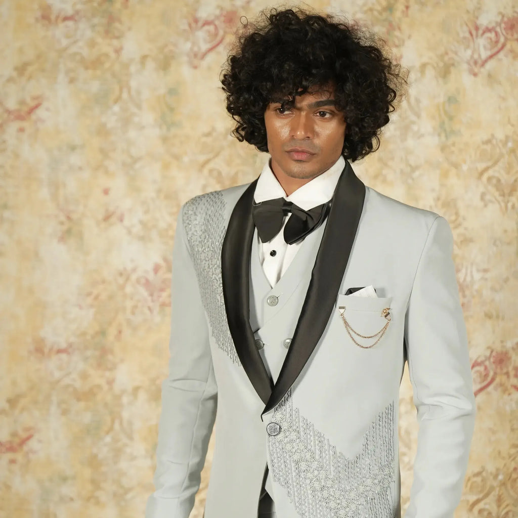 Light grey wedding suit rental with waistcoat and bow tie