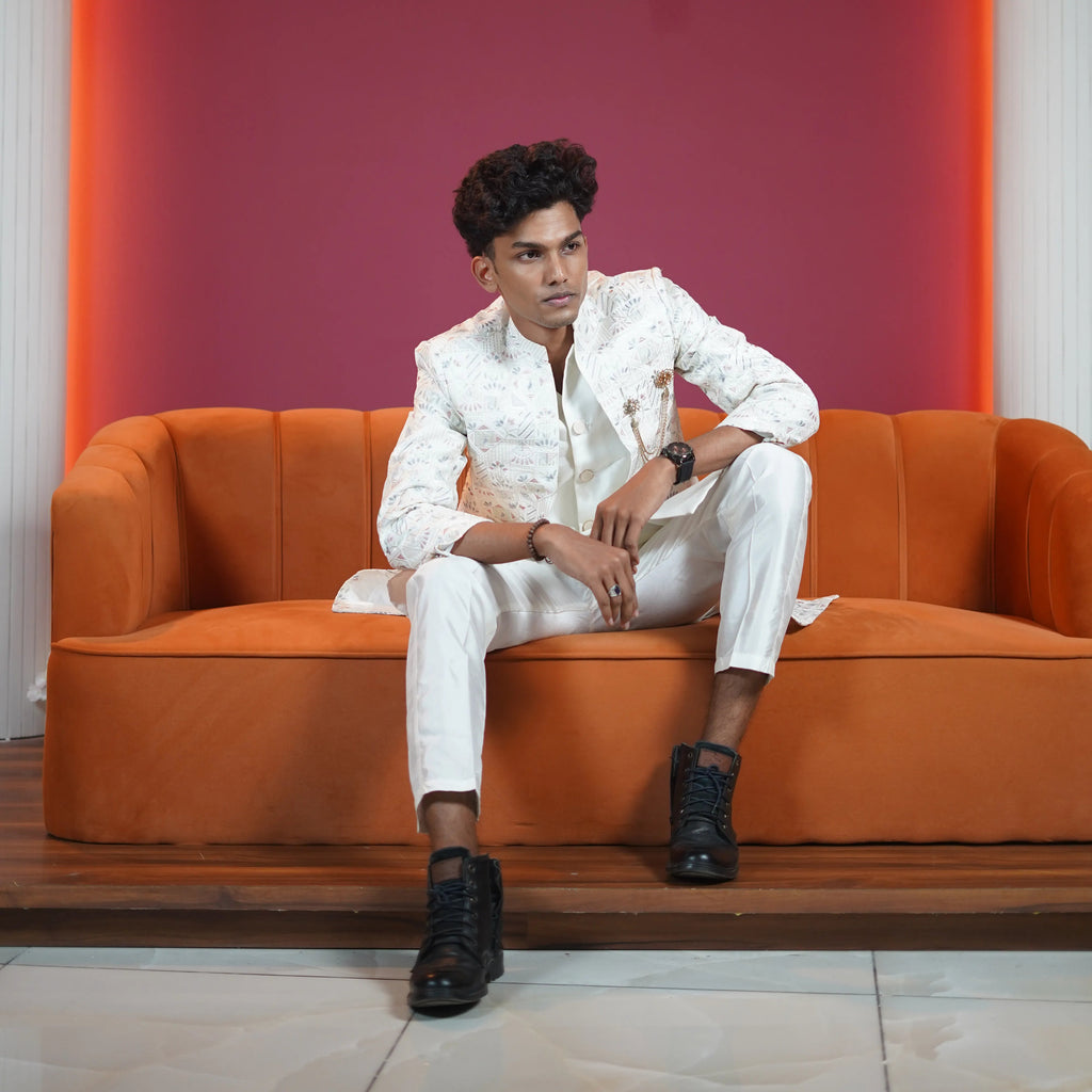 Ivory floral designer sherwani for groom available for rent at Posh Wedding Rental Kerala wedding dress rental