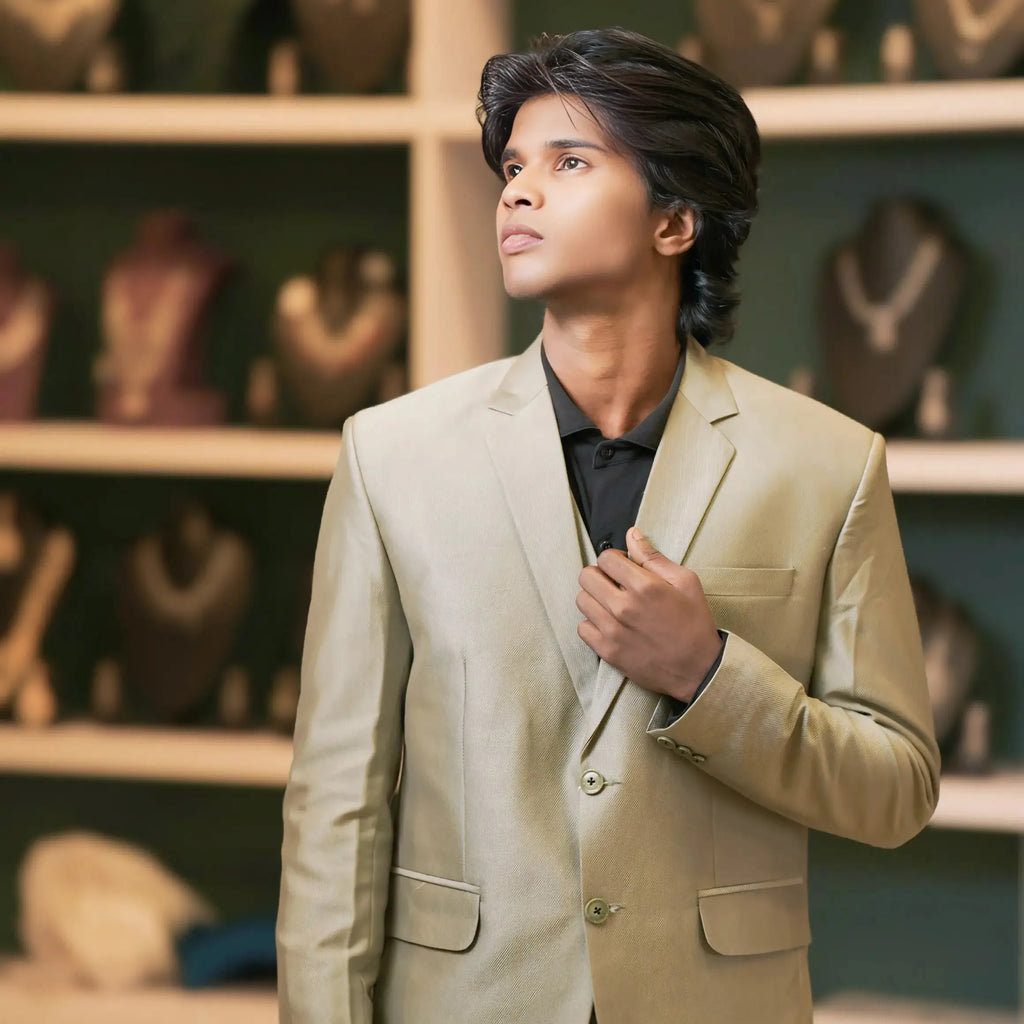 olive green designer men's suit for wedding available at posh wedding rental kerala