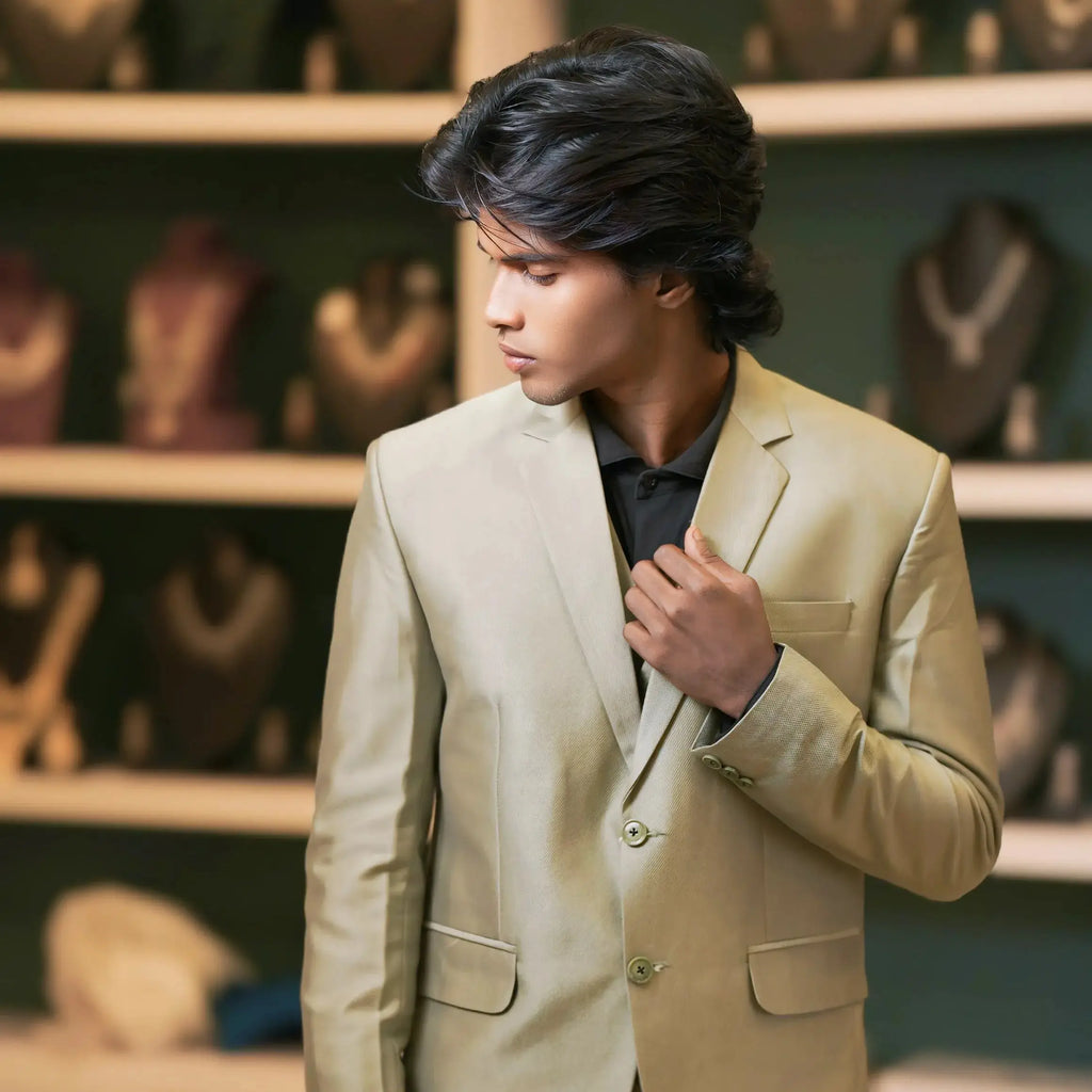 olive green designer men's suit for wedding available at posh wedding rental kerala