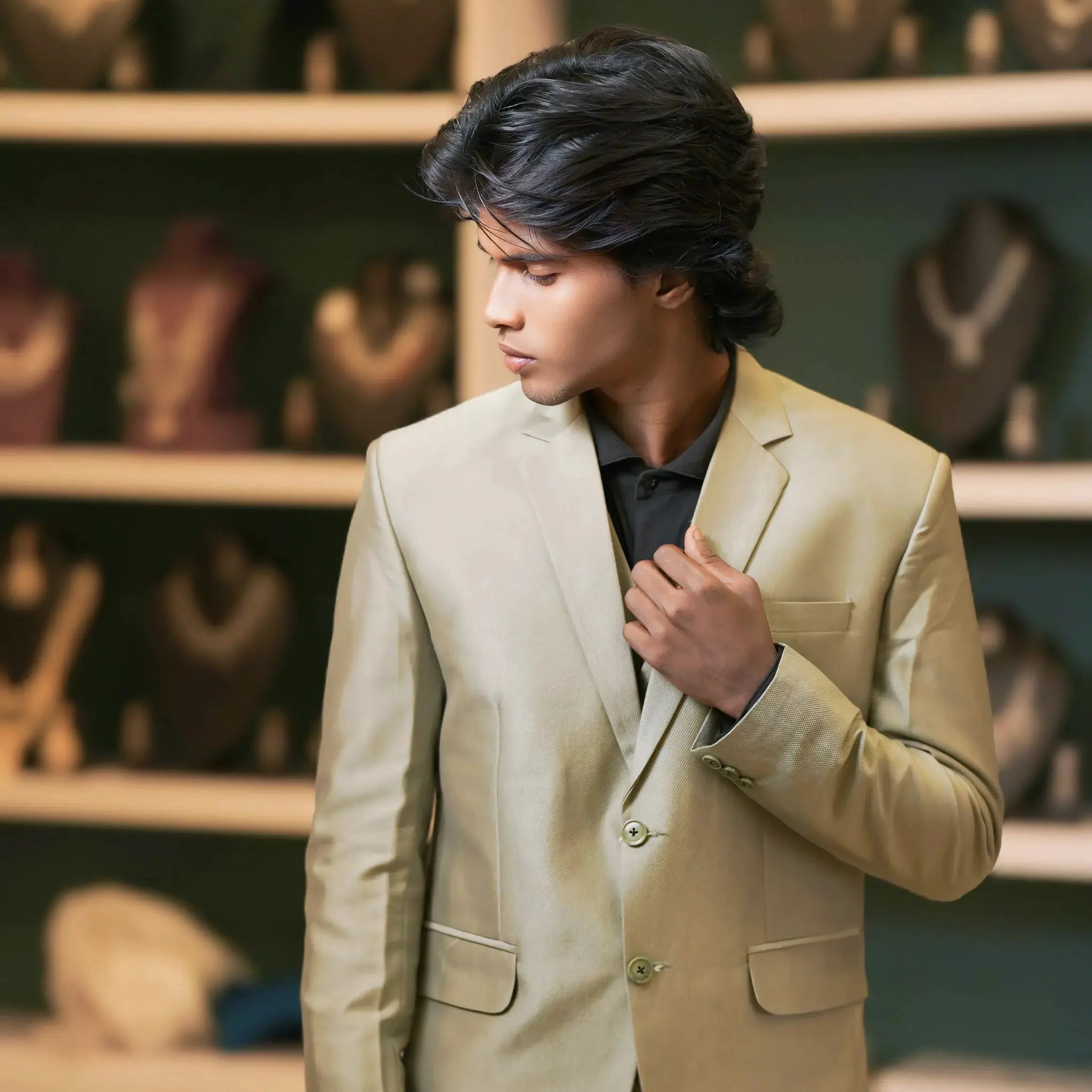 olive green designer men's suit for wedding available at posh wedding rental kerala