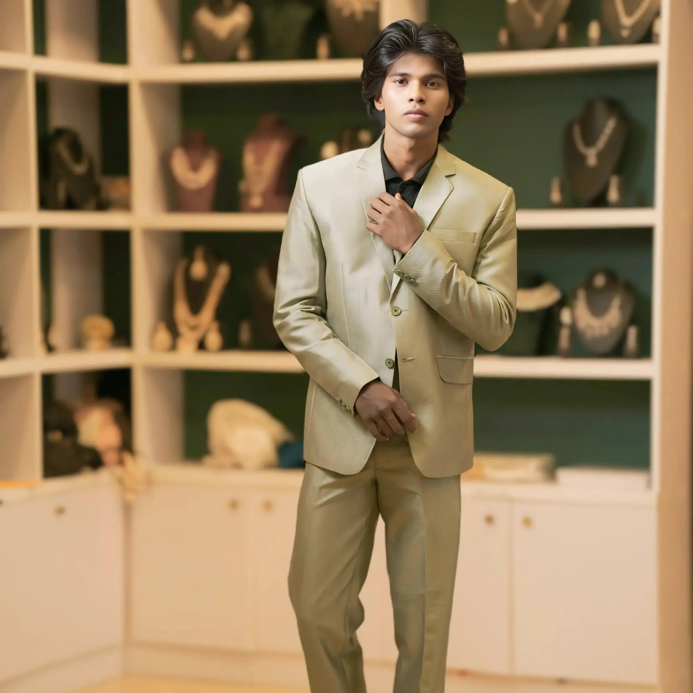 olive green designer men's suit for wedding available at posh wedding rental kerala