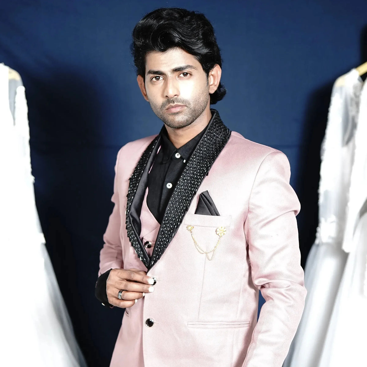Blush pink groom suit for wedding reception