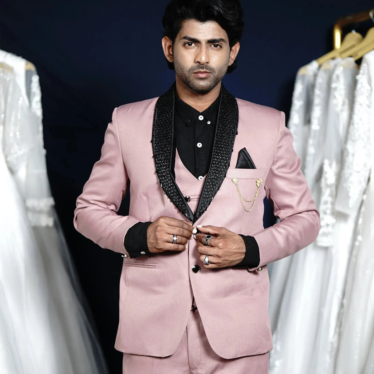 Pink designer suit with black embellished shawl lapel