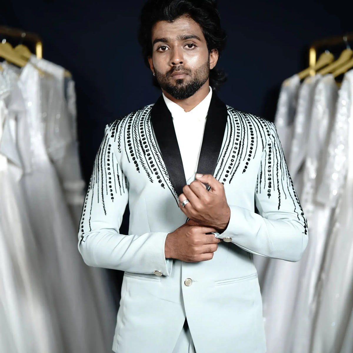 Pista green designer suit with black lapel for groom