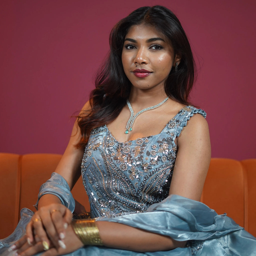 ice blue designer ball gown with sequin embroidery available at Posh Wedding Rental Kerala gown rental