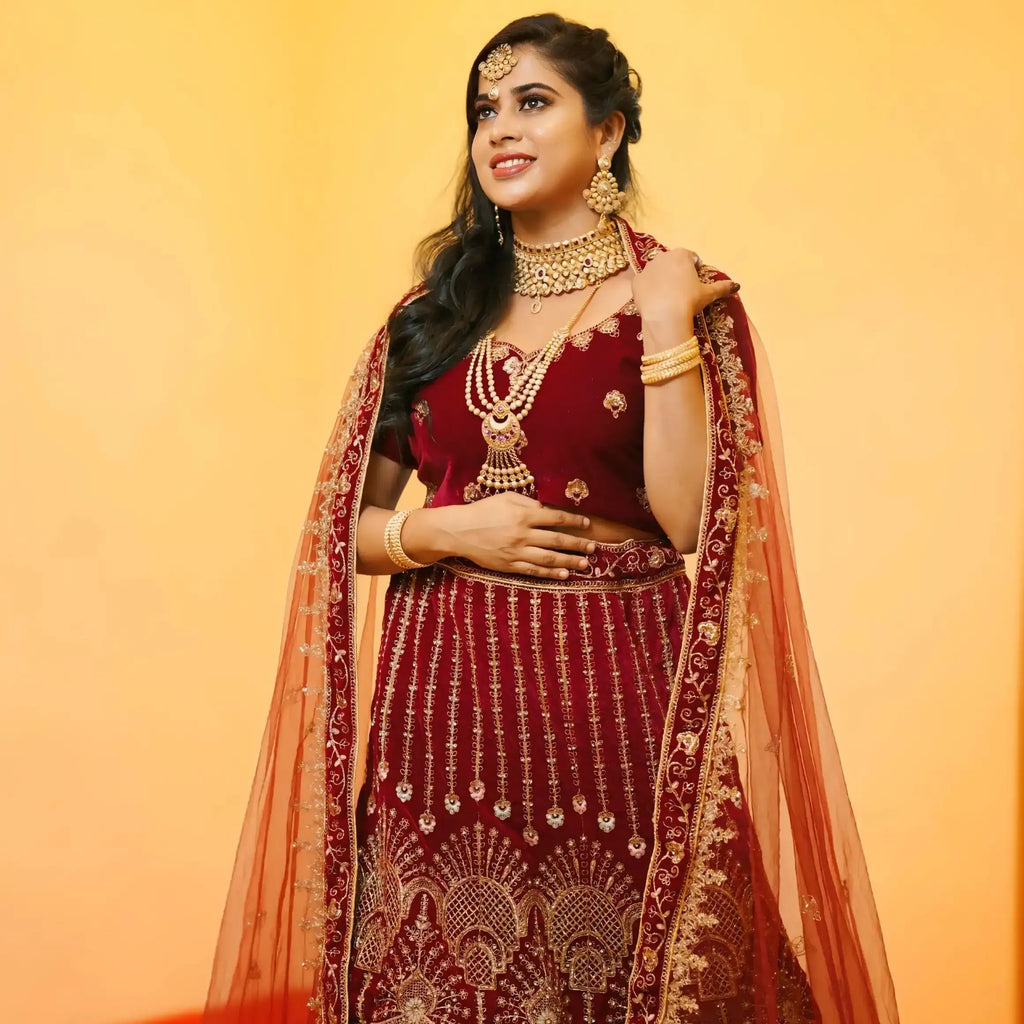 designer maroon lehenga wedding clothes rental kerala