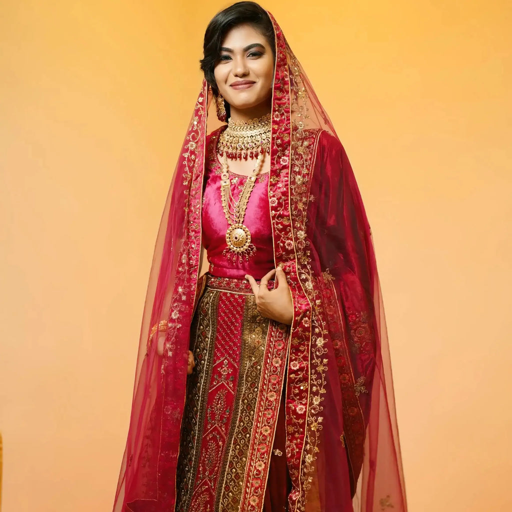 magenta pink bridal lehenga wedding dress rental kerala