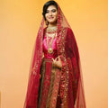 magenta pink bridal lehenga wedding dress rental kerala