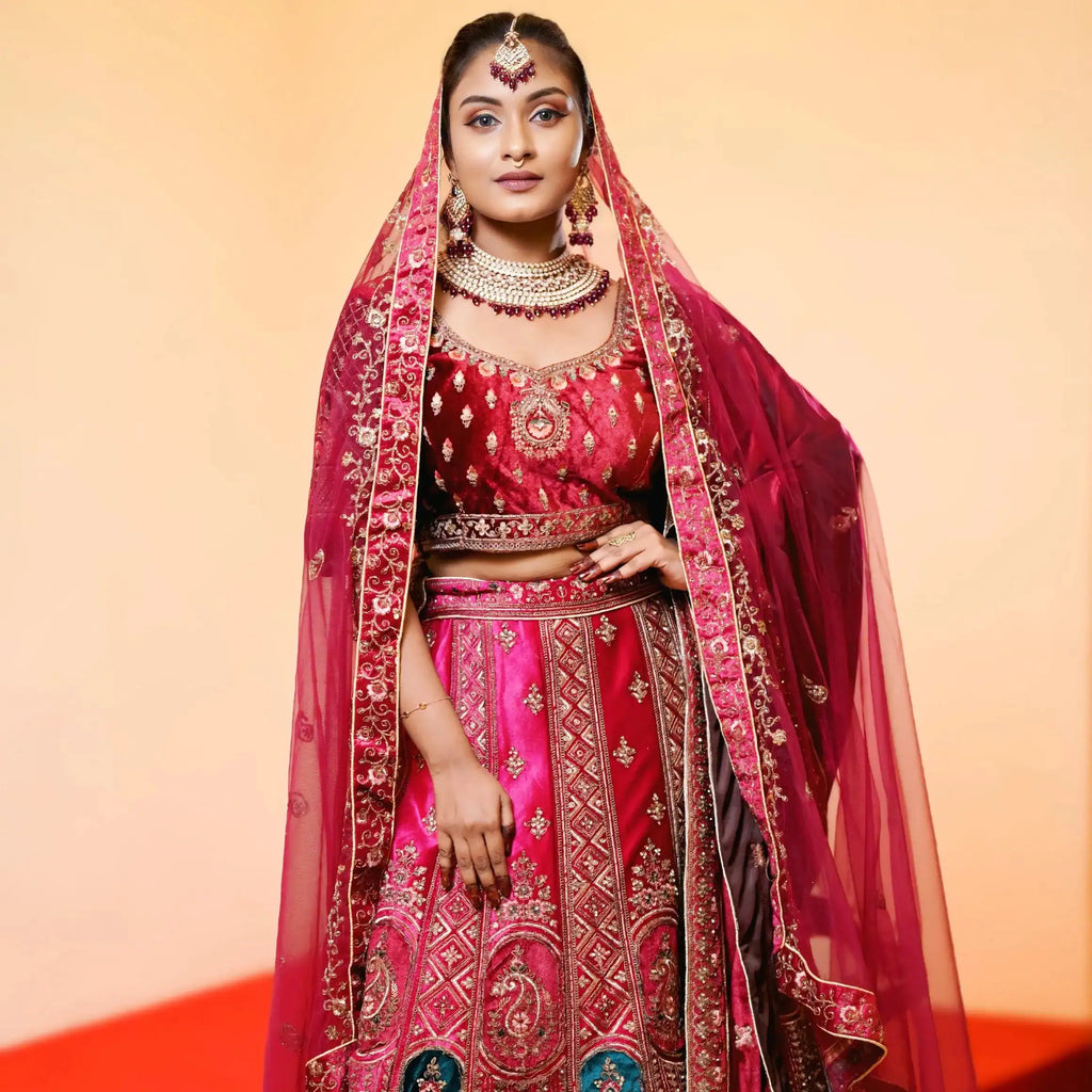 red bridal lehenga with embroidery for wedding rental kerala bride lehenga