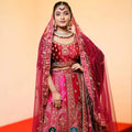 red bridal lehenga with embroidery for wedding rental kerala bride lehenga
