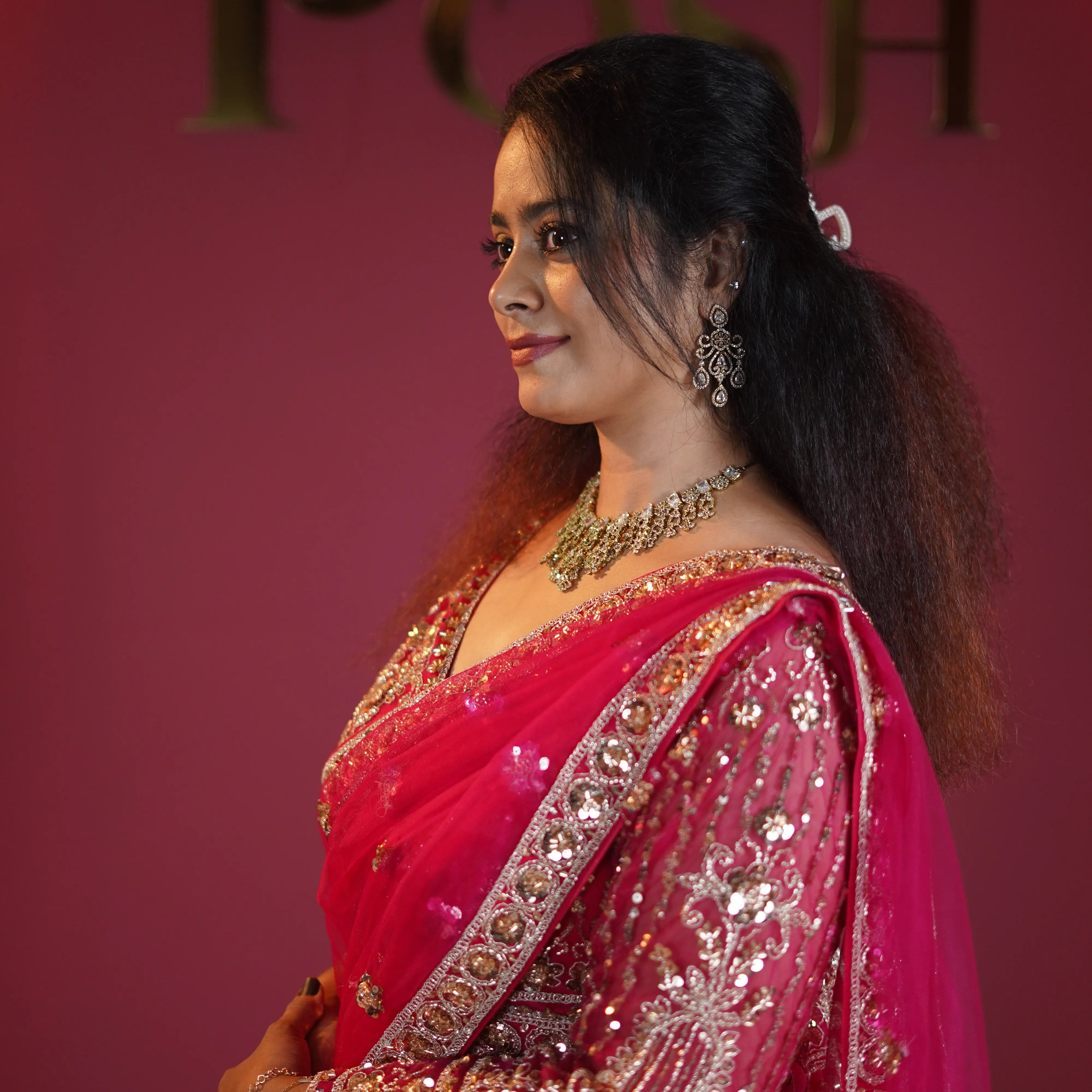 hot pink designer crop top lehenga with gold embroidery available at Posh Wedding Rental Kerala