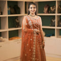 rust orange lehenga wedding dress rental kerala
