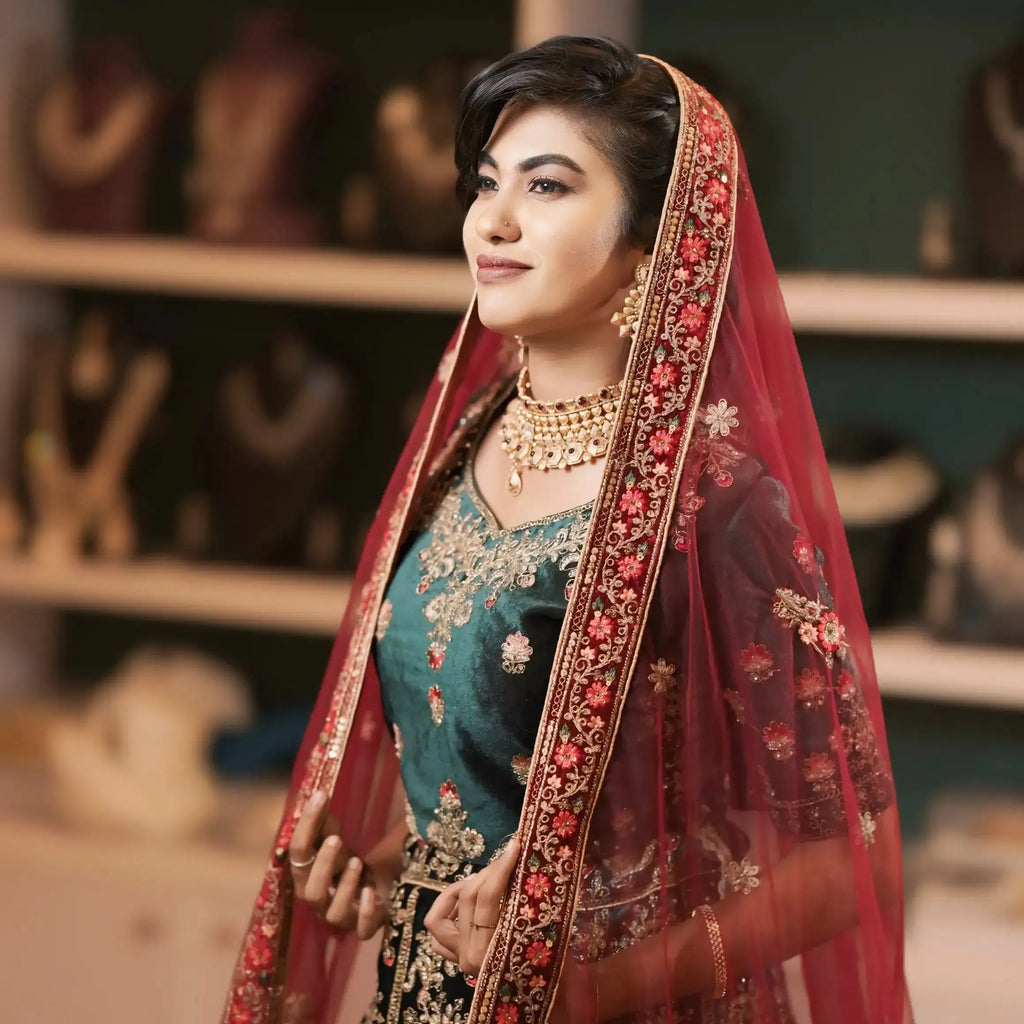 green maroon wedding lehenga rental kerala bride