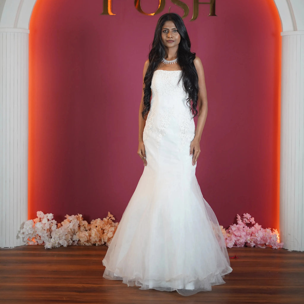 white mermaid bridal gown for bride available at Posh Wedding Rental Kerala wedding gown rental