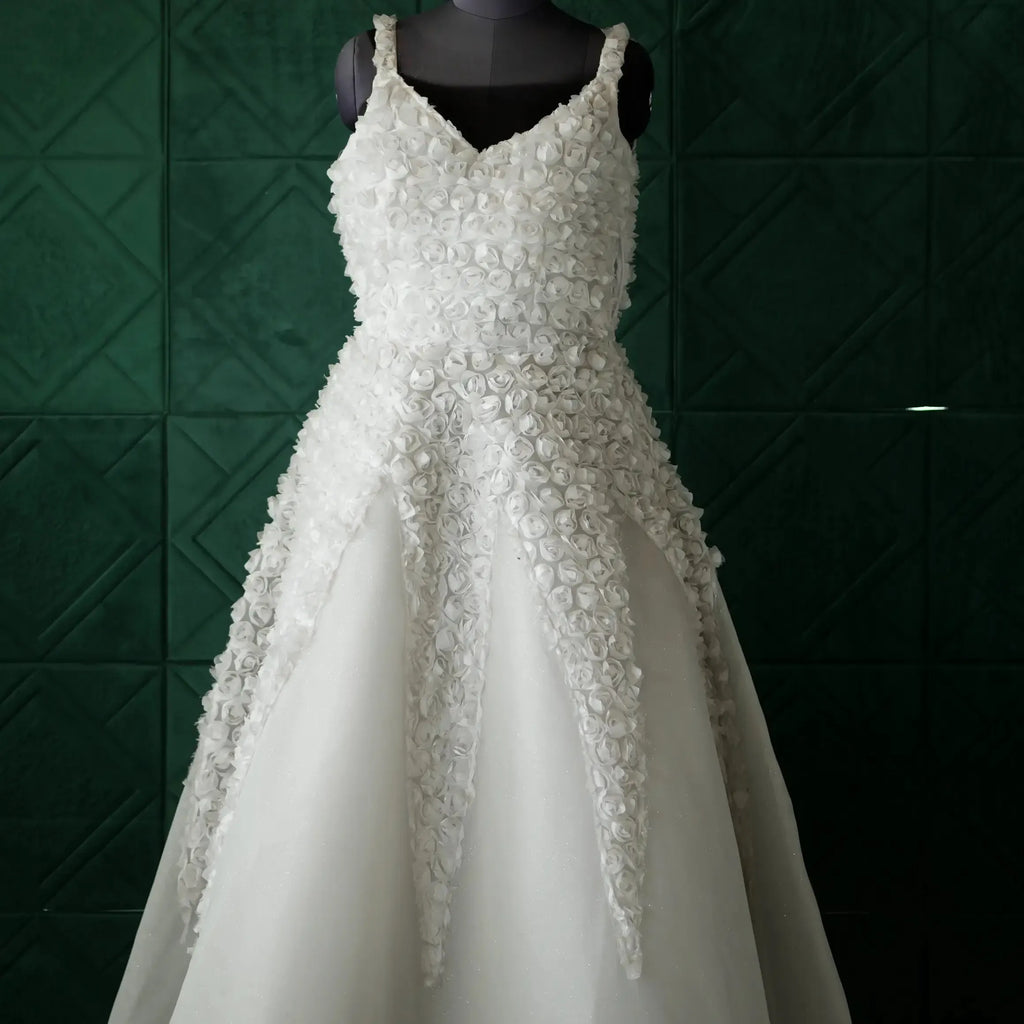 white wedding gown with floral design wedding dress rental kerala bridal look