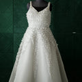 white wedding gown with floral design wedding dress rental kerala bridal look