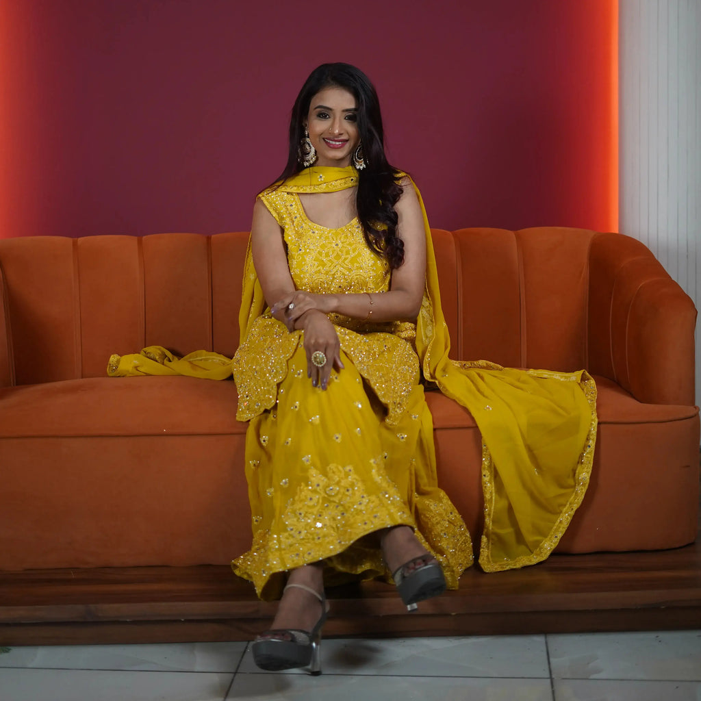 sunshine yellow embroidered sharara set for women available at Posh Wedding Rental Kerala haldi outfit rental